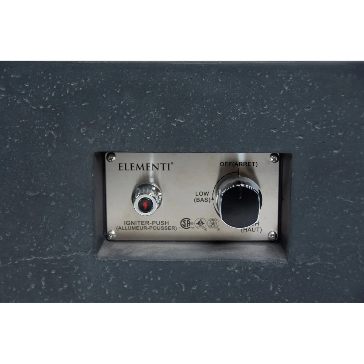 Stainless steel control panel with red push button igniter and black rotary dial on elementi plus cannes fire table 16 kw