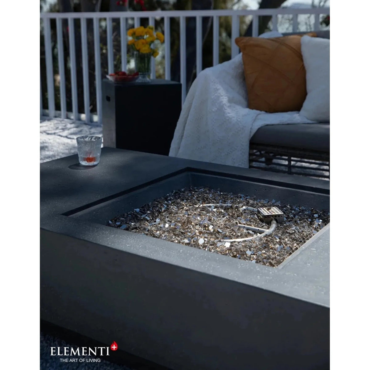 Elementi Plus Cannes fire table 16 kW modern gray concrete fire pit with reflective glass shards and minimalist design