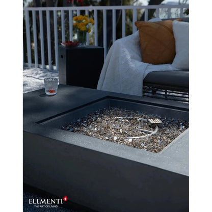 Elementi Plus Cannes fire table 16 kW modern gray concrete fire pit with reflective glass shards and minimalist design