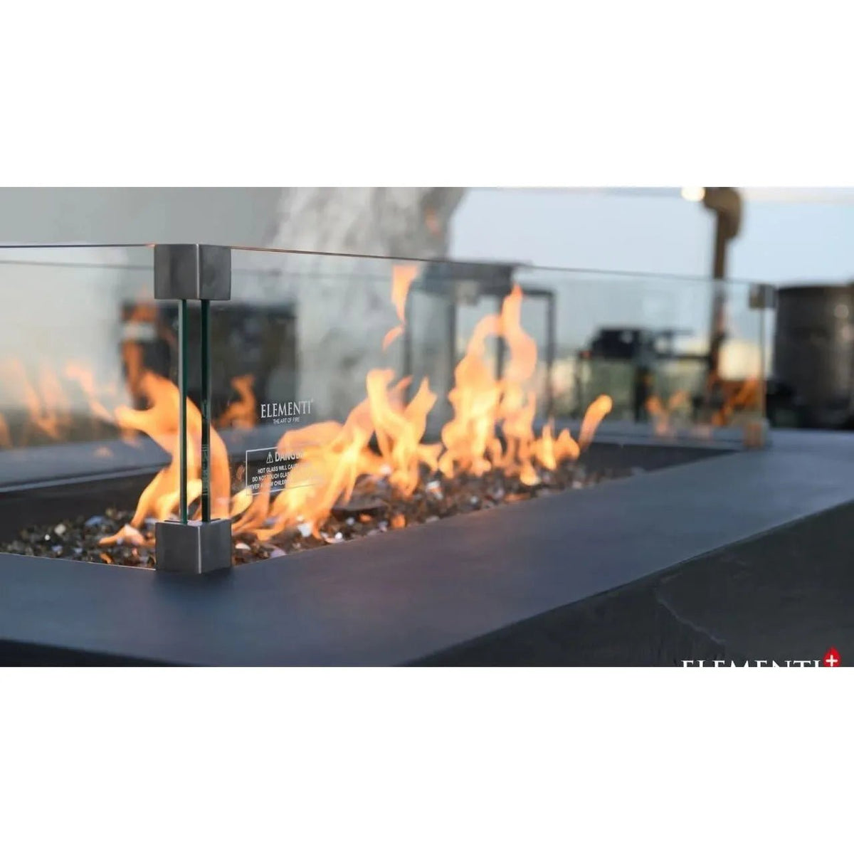 Modern black fire pit elementi plus cape town fire table with glass enclosure and metallic supports 16 kw