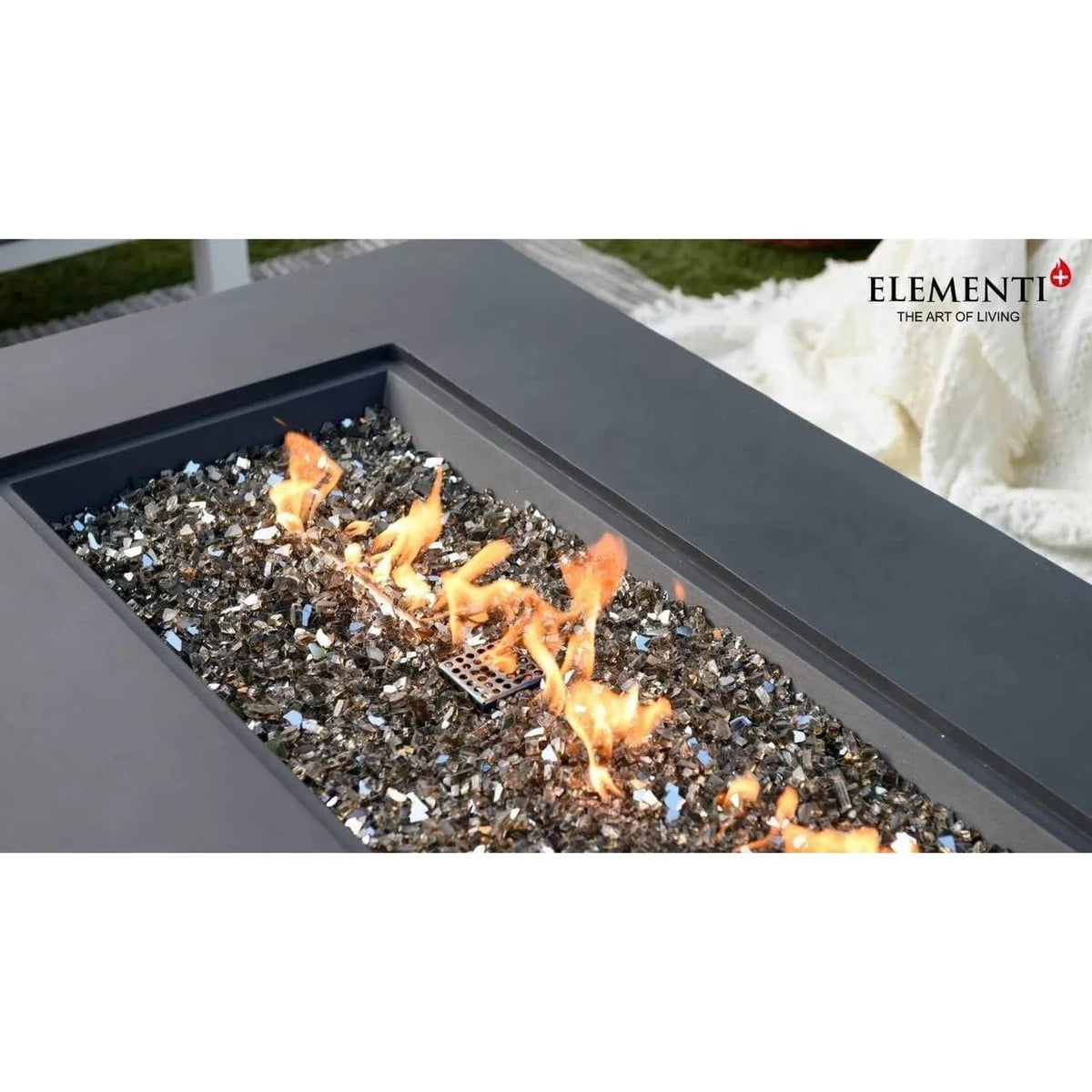 Elementi plus cape town fire table black rectangular fire pit with 16 kw power and glowing orange flames over dark glass shards