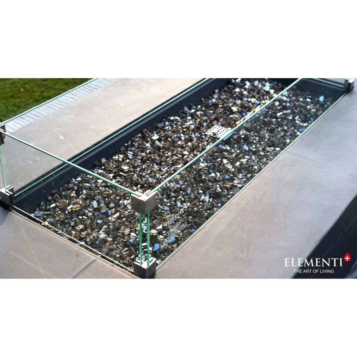 Elementi Plus Cape Town fire table with rectangular outdoor fire pit and glass enclosure featuring dark mosaic interior