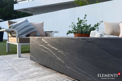 Dark gray textured outdoor coffee table with stone-like finish elementi plus cape town fire table 16 kw ofg410sl