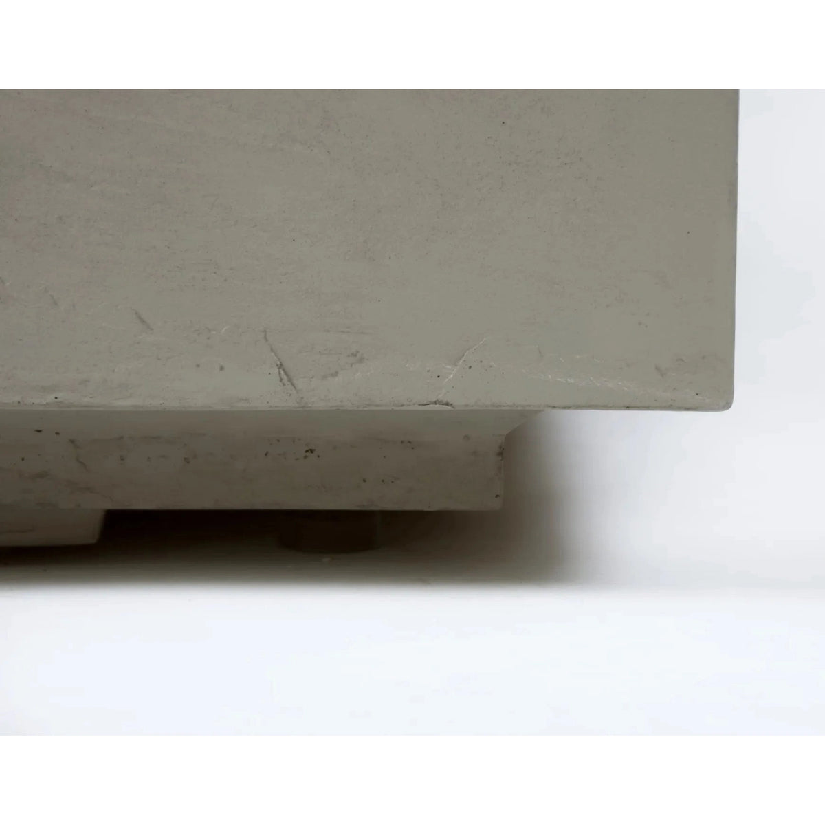 Elementi Plus Capertee fire table 16 kW in off-white minimalist concrete with smooth textured surface and subtle imperfections