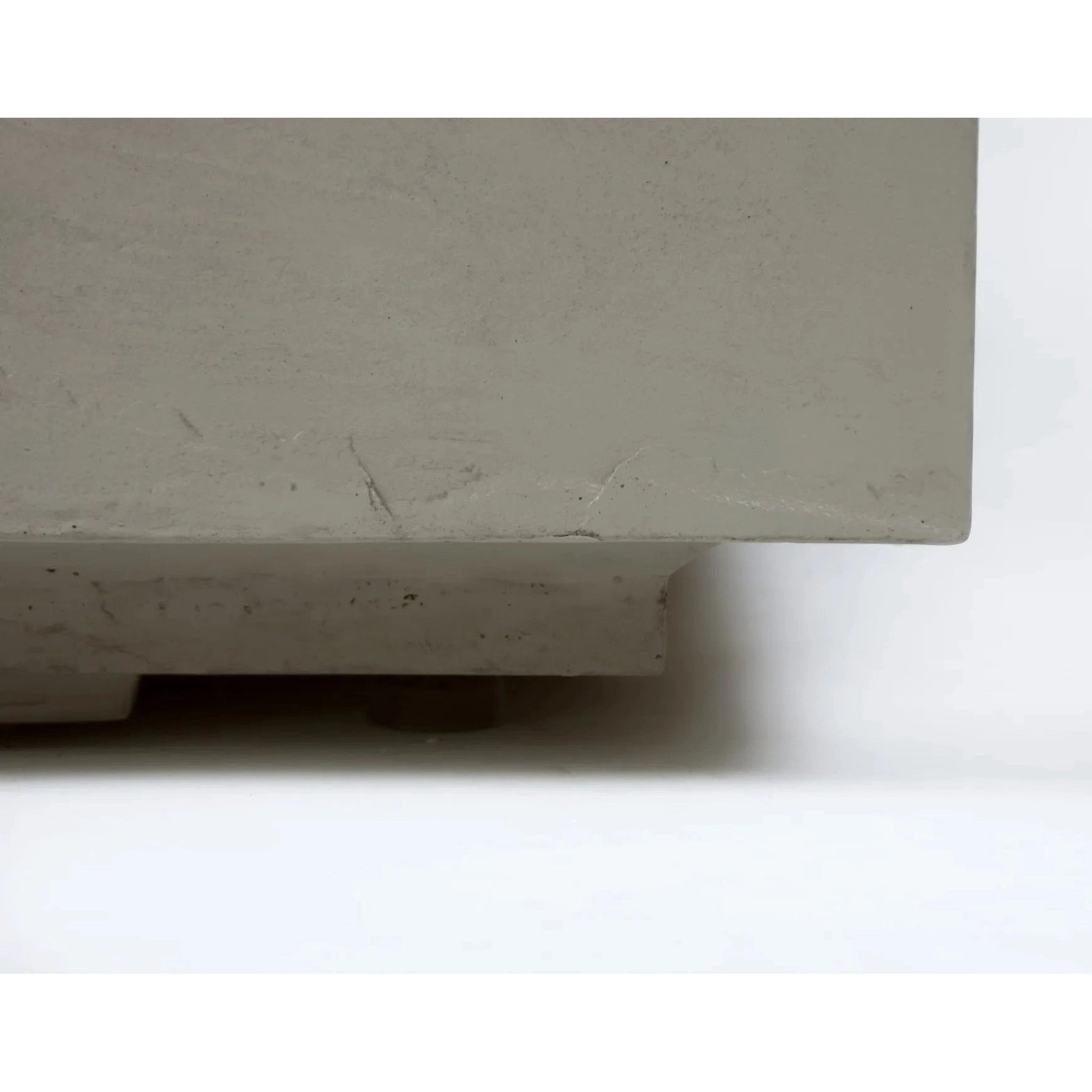 Elementi Plus Capertee fire table 16 kW in off-white minimalist concrete with smooth textured surface and subtle imperfections