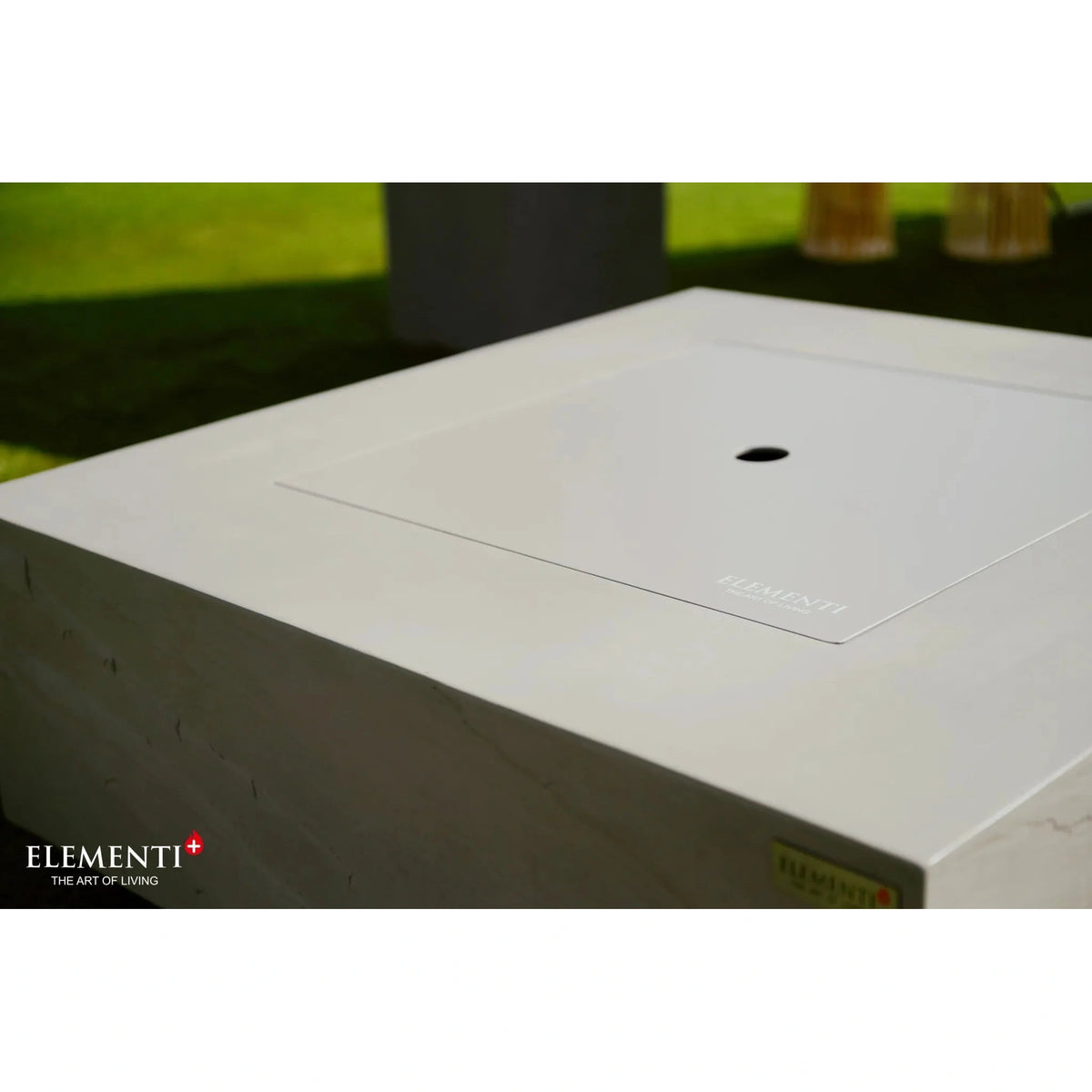 White rectangular outdoor shower base with central drain and subtle branding for elementi plus capertee fire table 16 kw