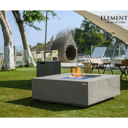 Gray concrete elementi plus capertee fire table with blue glass beads and orange flames producing 16 kW heat