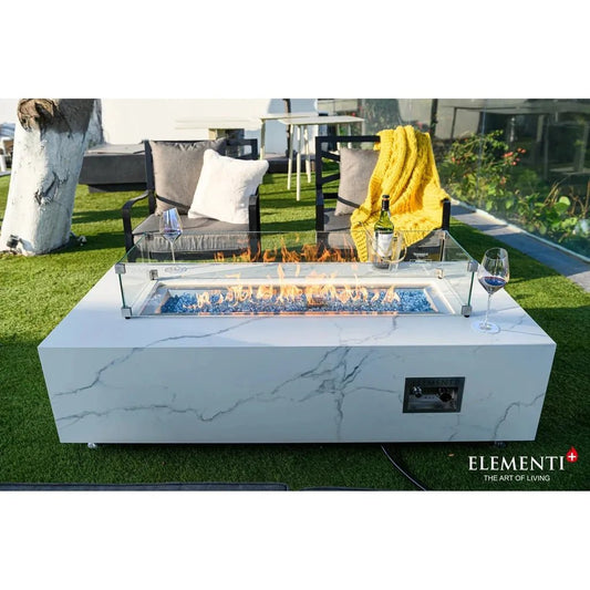 Elementi plus carrara fire table 16 kW white marble-patterned rectangular fire pit with glass enclosure and blue flame beads