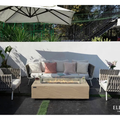 Beige rectangular Elementi Plus Colorado fire table with glass top and visible flames 16 kW outdoor heater