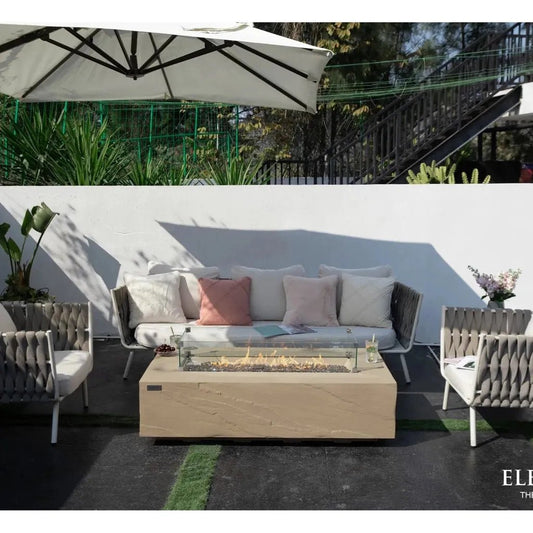 Beige rectangular Elementi Plus Colorado fire table with glass top and visible flames 16 kW outdoor heater