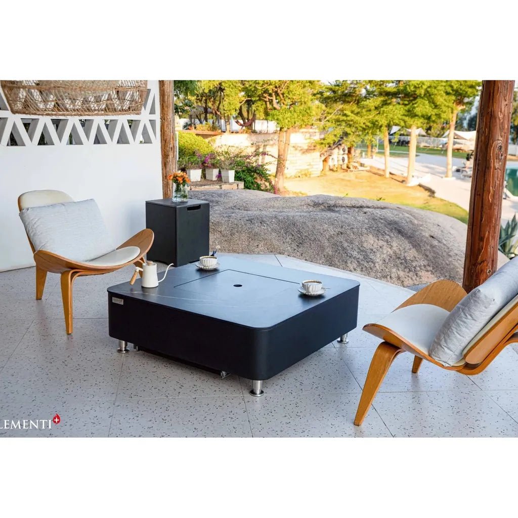 Black rectangular outdoor coffee table with porcelain top fire table and silver legs elementi plus copenhagen