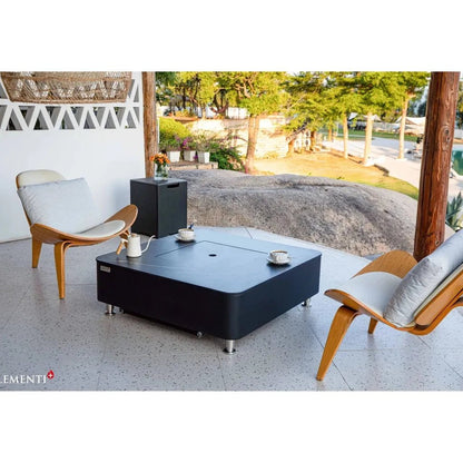 Black rectangular outdoor coffee table with porcelain top fire table and silver legs elementi plus copenhagen