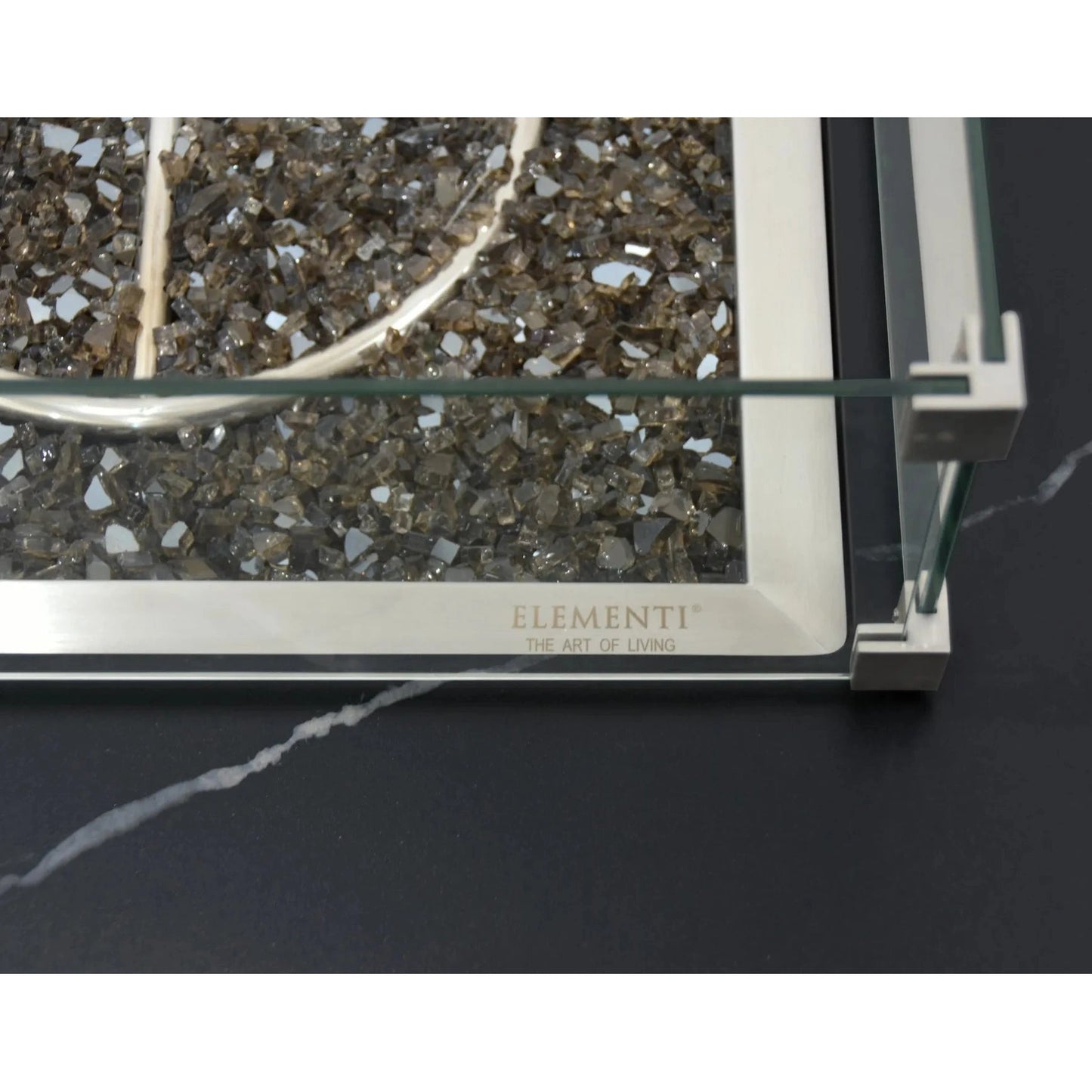 Elementi plus Copenhagen porcelain top fire table with 16 kW heat and glass front displaying gray silver mosaic stones