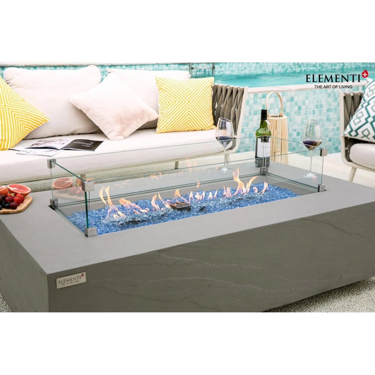 Gray rectangular fire pit table with glass top and blue flameless gas burners elementi plus meteora fire table