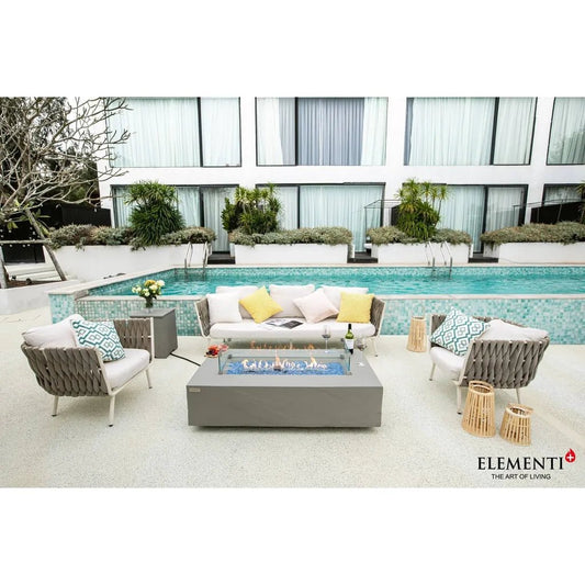 Gray rectangular glass top fire pit with blue flame elementi plus meteora fire table 16 kw ofg410sg