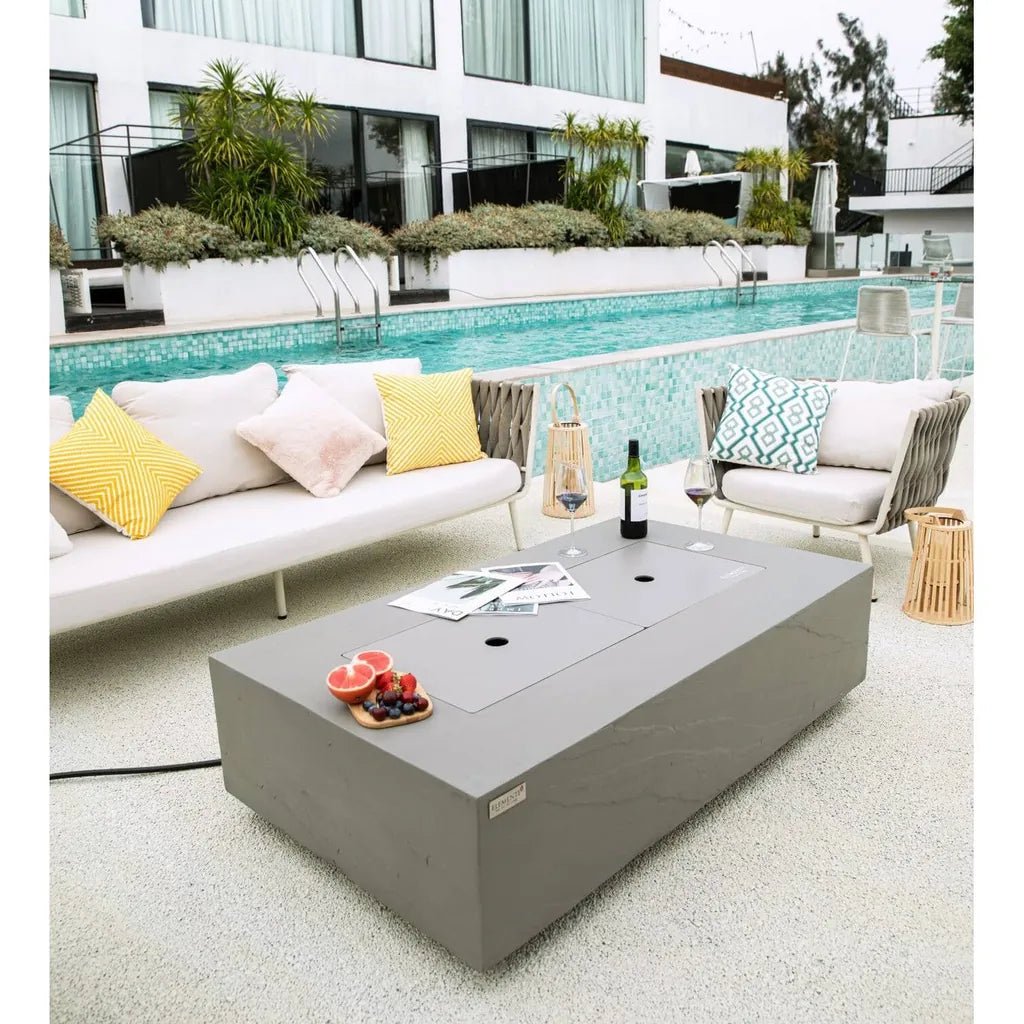 Elementi Plus Meteora fire table gray rectangular outdoor fire pit with smooth surface and circular flame openings 16 kW