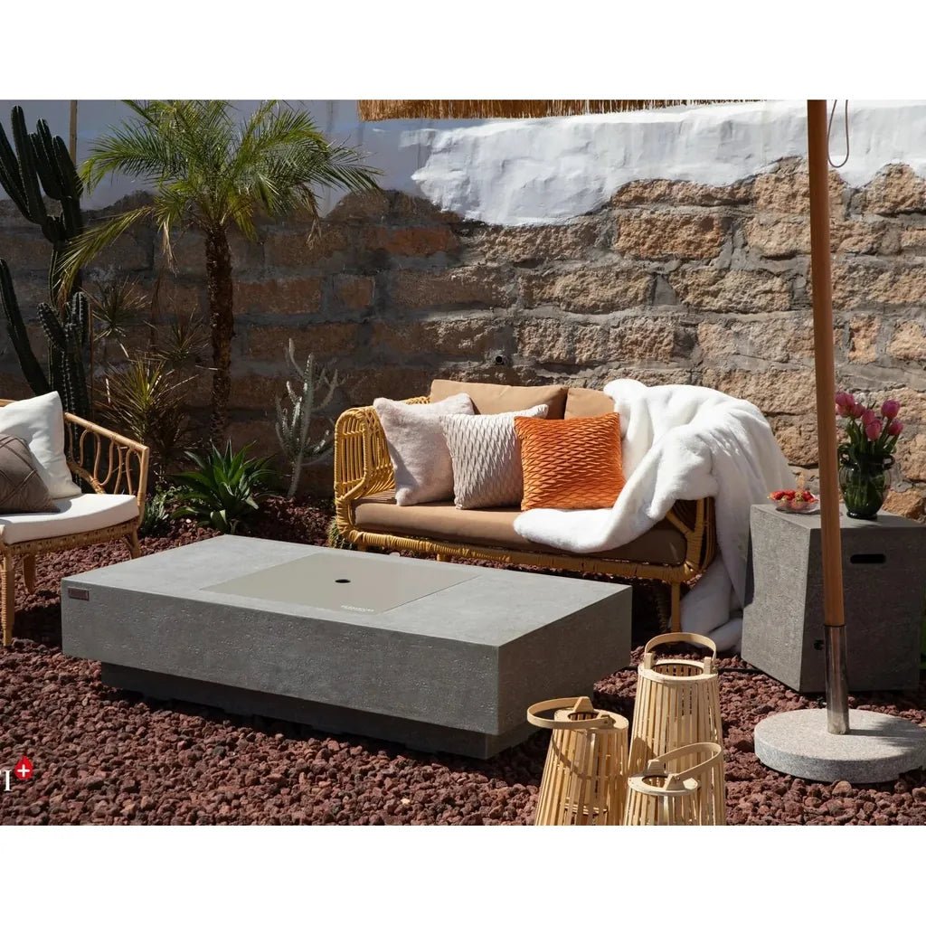 Gray concrete rectangular Elementi Plus Monte Carlo fire table with smooth minimalist design and central recessed flame area