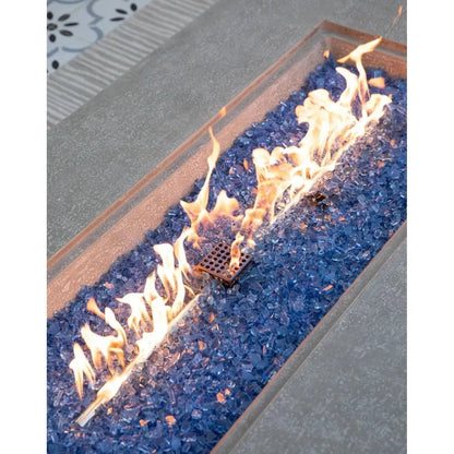Elementi plus riviera fire table rectangular fire pit with blue glass beads and central burner emitting lively flames