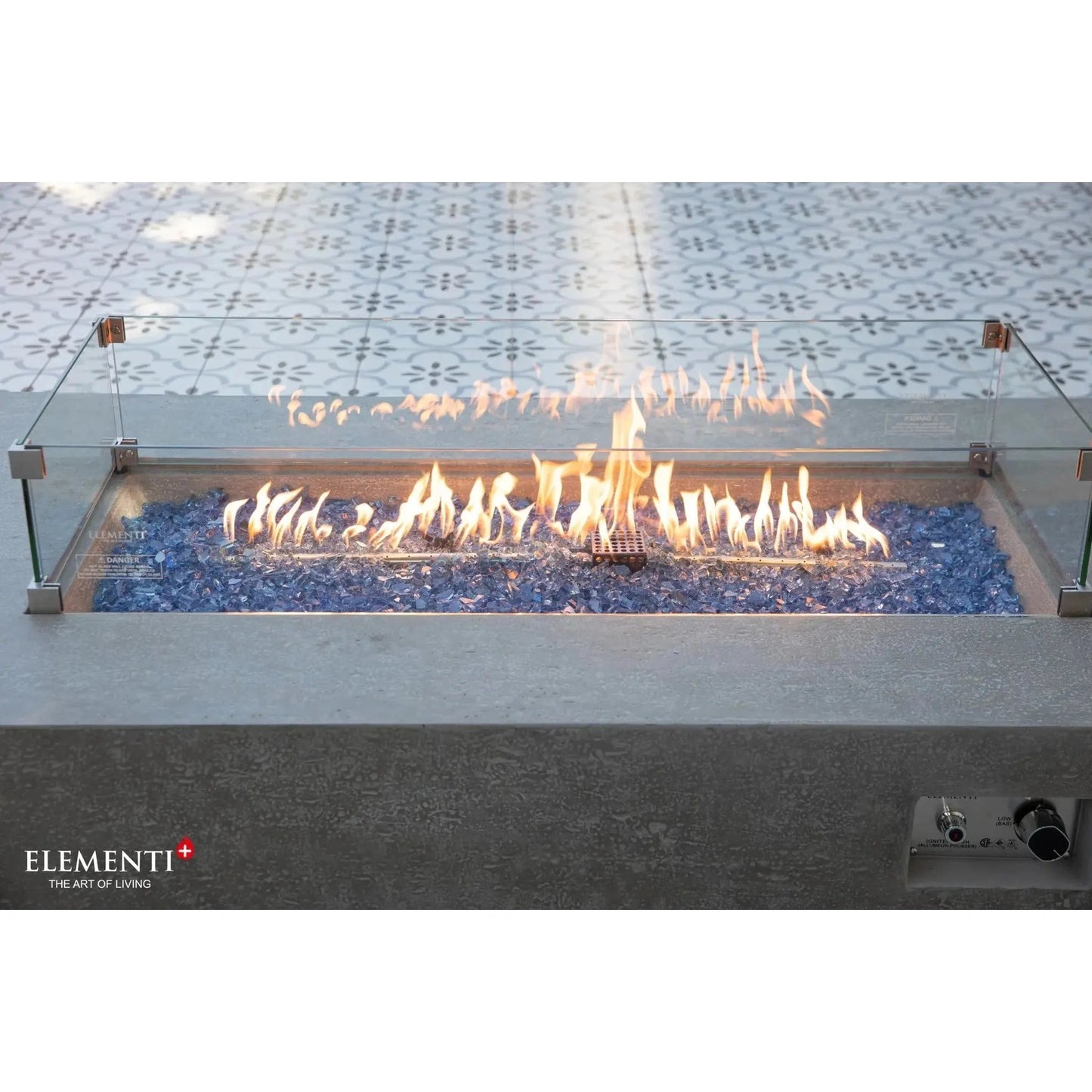 Elementi Plus Riviera fire table modern rectangular fire pit with glass enclosure blue flameless stones concrete base