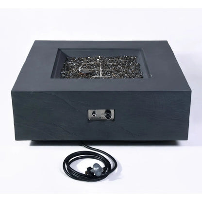 Elementi Plus Roraima fire table 16 kW with modern black stone fire pit and rectangular glass-enclosed burner with gray gravel