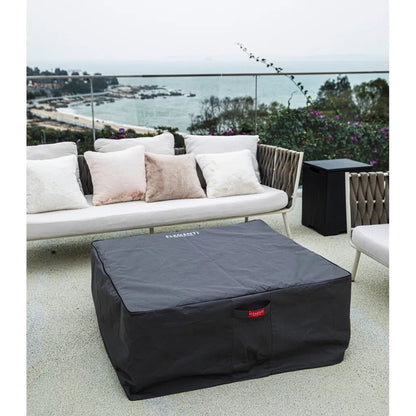 Black fabric cover for Elementi Plus Roraima Fire Table outdoor coffee table with small red logo patch on side