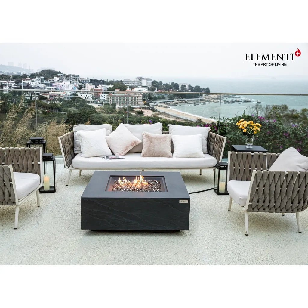 Black rectangular metal fire pit with visible flame elementi plus roraima fire table 16 kW ofg411sl