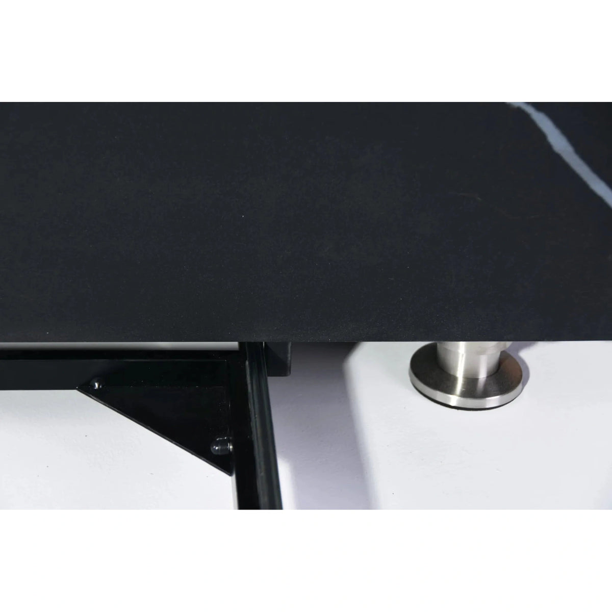 Elementi Plus Sofia Fire Table with 16 kW features a black marble tabletop and a sleek metallic circular foot