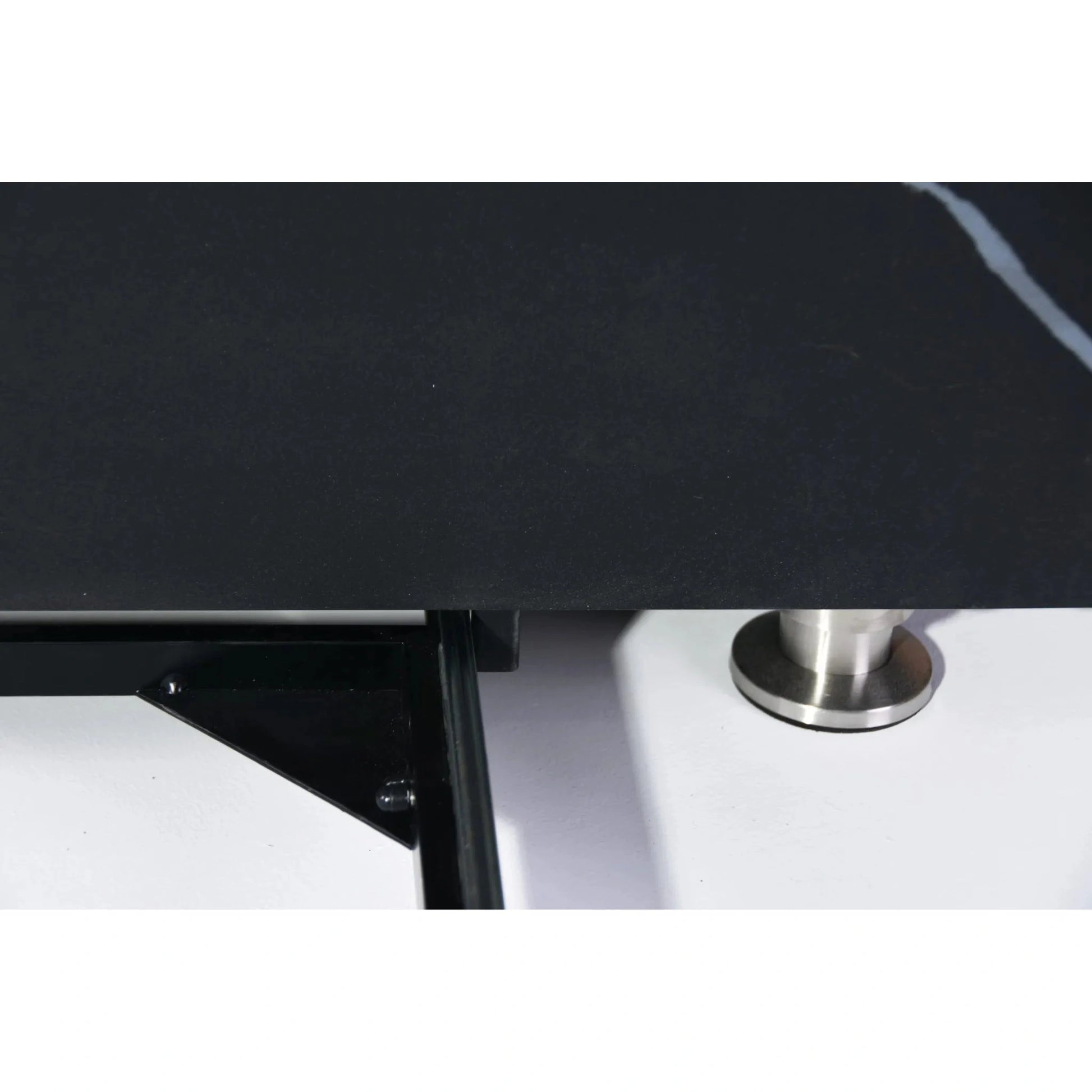 Elementi Plus Sofia Fire Table with 16 kW features a black marble tabletop and a sleek metallic circular foot