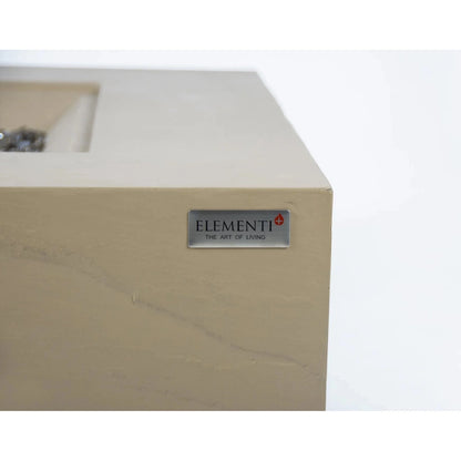 Beige marble elementi plus uluru fire table fireplace with sleek silver plaque featuring elementi brand name