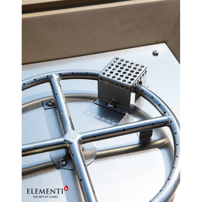 Silver metallic burner assembly with perforated square component mounted on circular stainless steel frame for elementi plus uluru fire table 16 kw