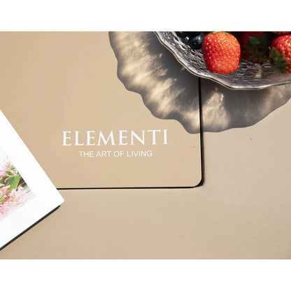 A silver textured glass bowl holding red strawberries and dark berries featured with the elementi plus uluru fire table 16 kw