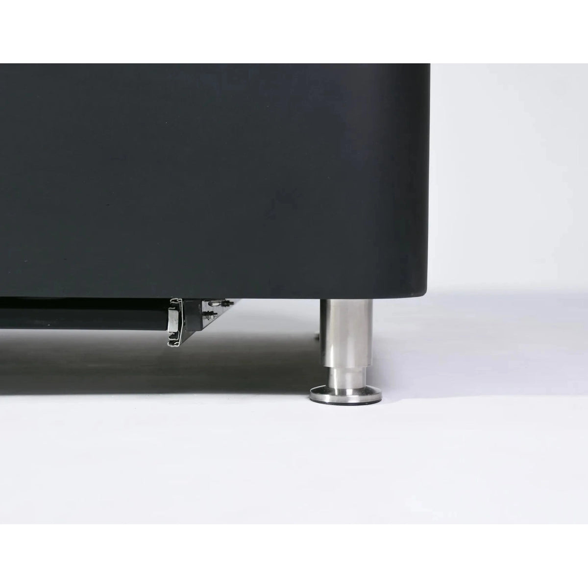 Black matte finished cabinet leg with polished chrome base and foot on elementi plus valencia fire table 16 kw