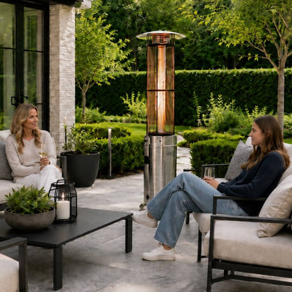 Emporio stainless steel flame heater with copper-colored glass enclosure and black horizontal bands for patios