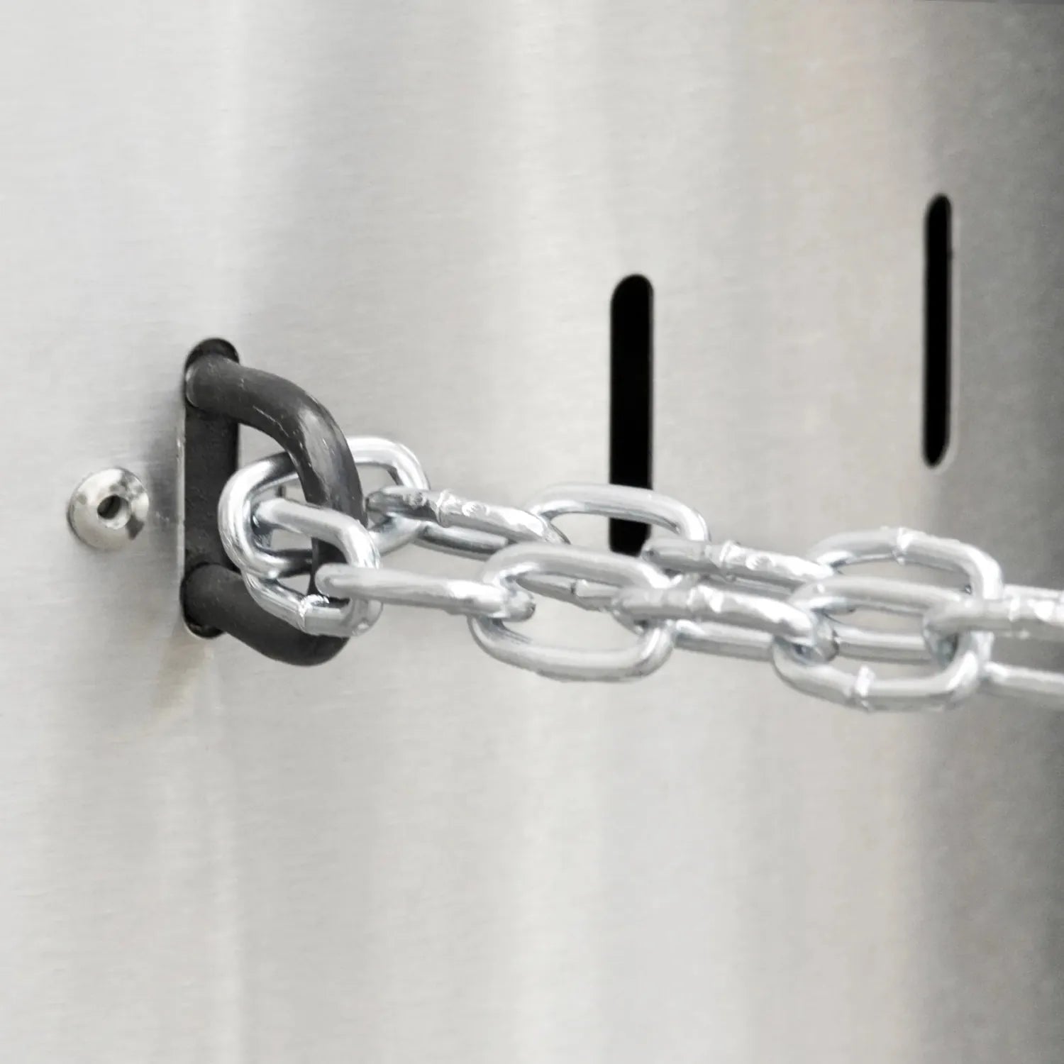 Silver metal chain with black rubber-coated d-ring attached to metallic surface on enders commercial patio heater lfs840