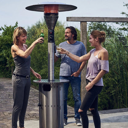 Stainless steel Enders commercial patio heater with red and black burner assembly and circular glass top for outdoor use