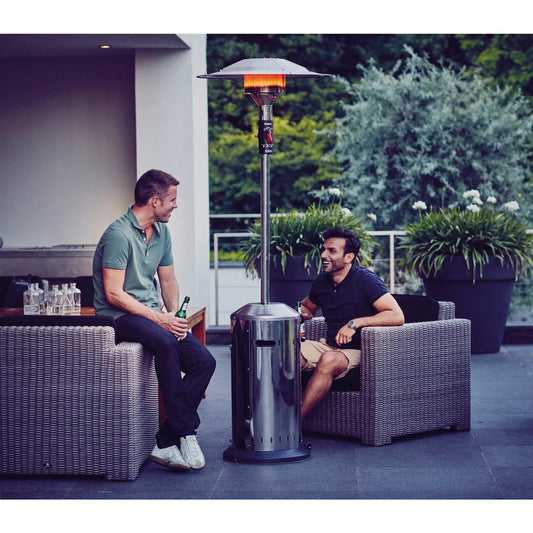 Stainless steel Enders Elegance ECO patio heater with sleek cylindrical base and flat-top burner glowing orange light