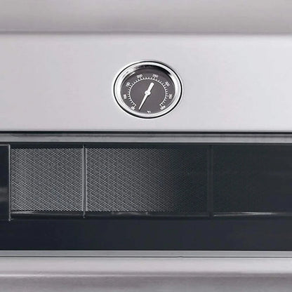 Circular temperature gauge with black face and silver rim mounted on stainless steel exterior of enders kansas pro 3 sik turbo gas barbecue