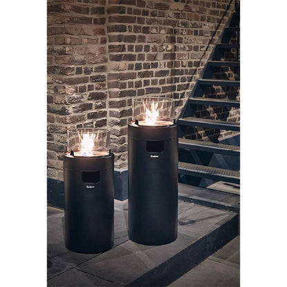 Two sleek black ember gas fire pits with glass tops and glowing flames from enders medium black nova led flame patio heater en5600