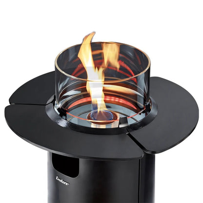Black cylindrical Enders NOVA LED flame patio heater shelf set with clear glass flame holder and glowing orange flames