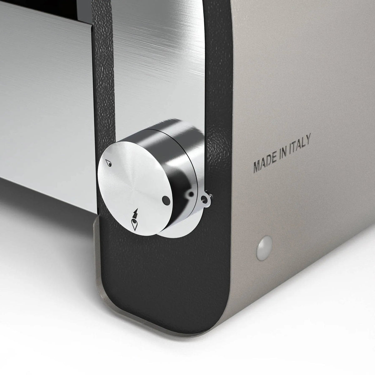 Silver brushed metal control knob with black base and white arrow on gray Fontana Maestro 60 gas countertop pizza oven marked made in Italy