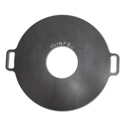 Black cast iron bonfeu plancha grill plate with central hole and side handles for bonfeu outdoor fireplaces