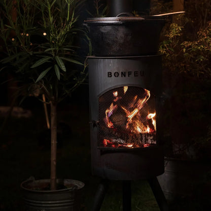 Black metal bonfeu bongiano sp outdoor fireplace with mesh front and glowing embers inside for outdoor use