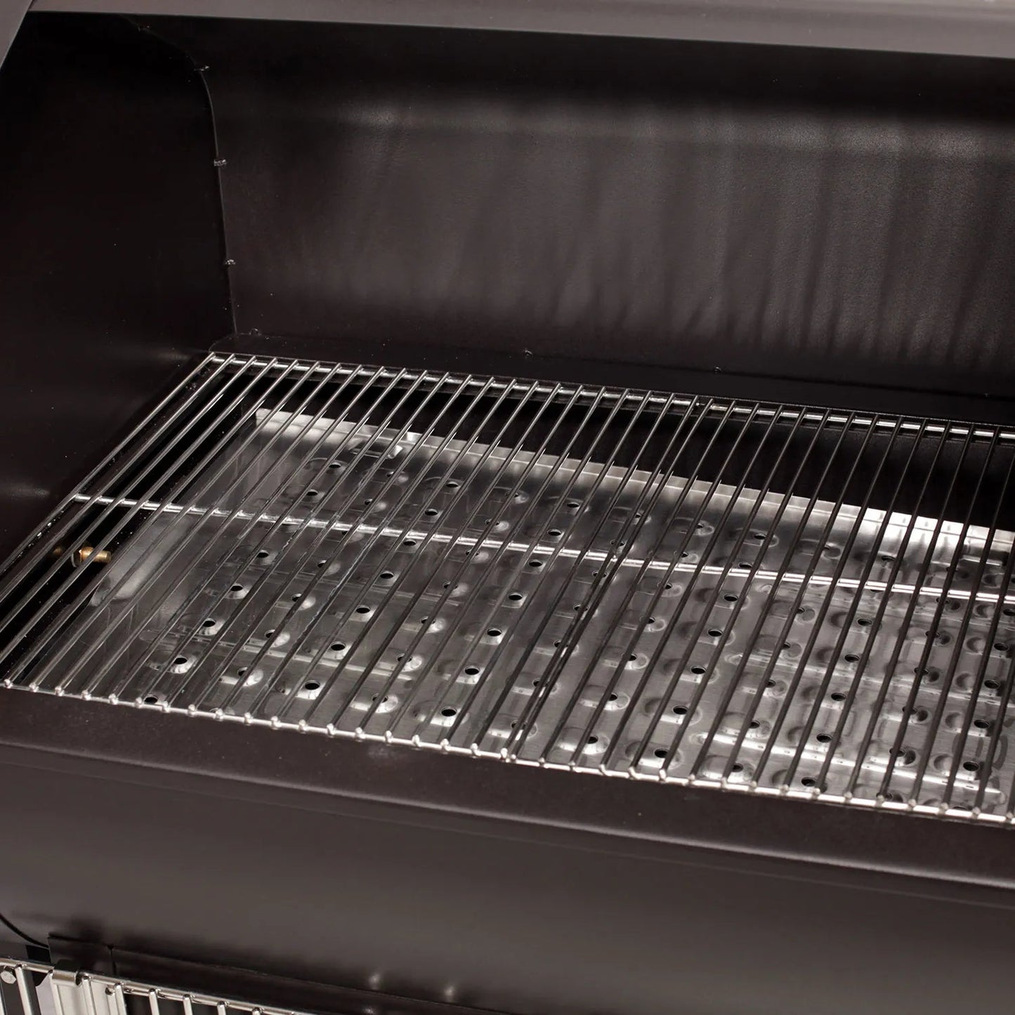 The GMG Daniel Boone Choice WiFi pellet grill smoker is a black rectangular grill with a metal grate inside