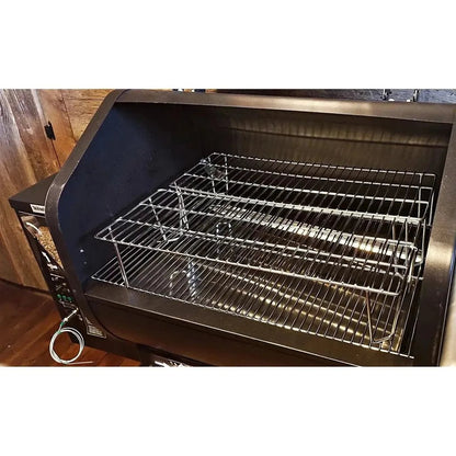 Black stainless steel pellet grill with two wire racks shown inside gmg upper rack for pellet grills product
