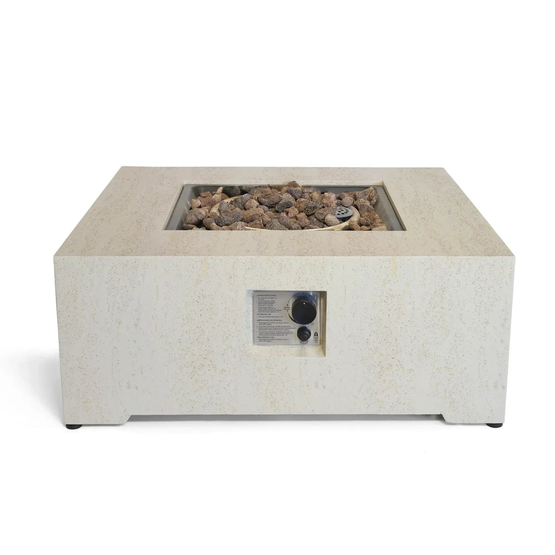 Beige concrete square fire pit with recessed rectangular burner filled with gray and brown lava rocks by Happy Cocooning Estate