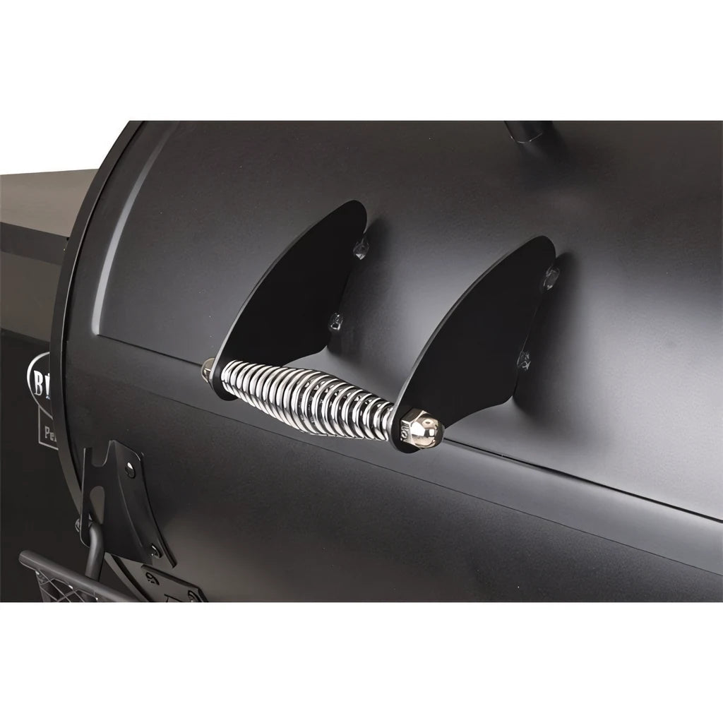 Black metal spring-loaded handle with polished chrome ends on lifestyle big horn pellet smoker and grill lfs256