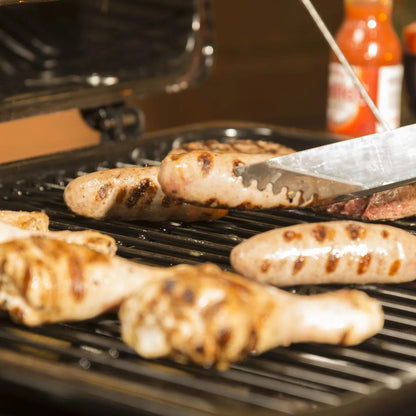 Grilled sausages with charred marks on a black grate of the Lifestyle Cuba 2 gas burner BBQ LFS687Q barbecue grill