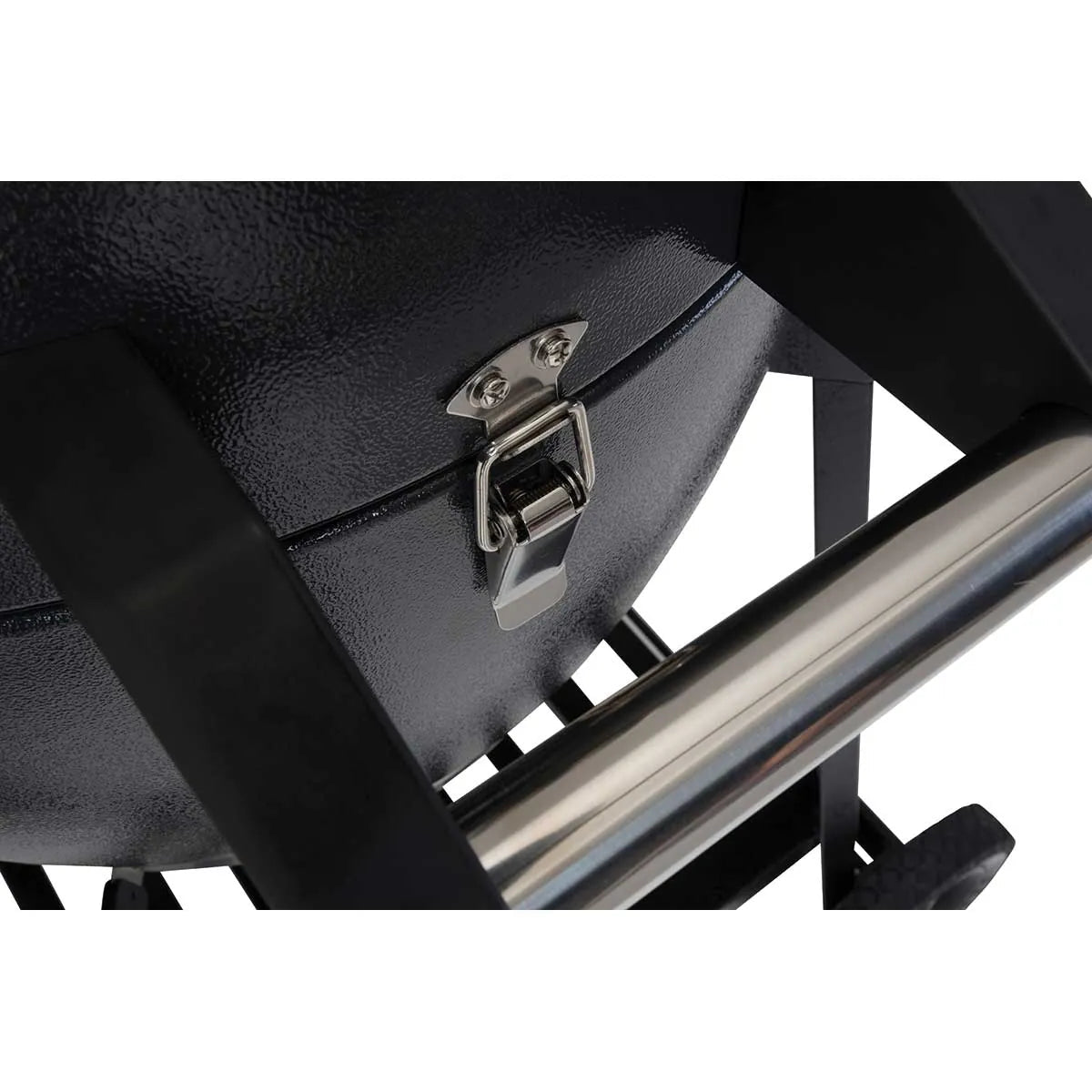 Black textured lifestyle dragon egg charcoal bbq grill with silver metal latch and handle for outdoor cooking