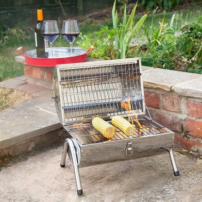 Stainless steel lifestyle explorer portable charcoal bbq lfs105 with folding wire mesh grate grilling two ears of corn
