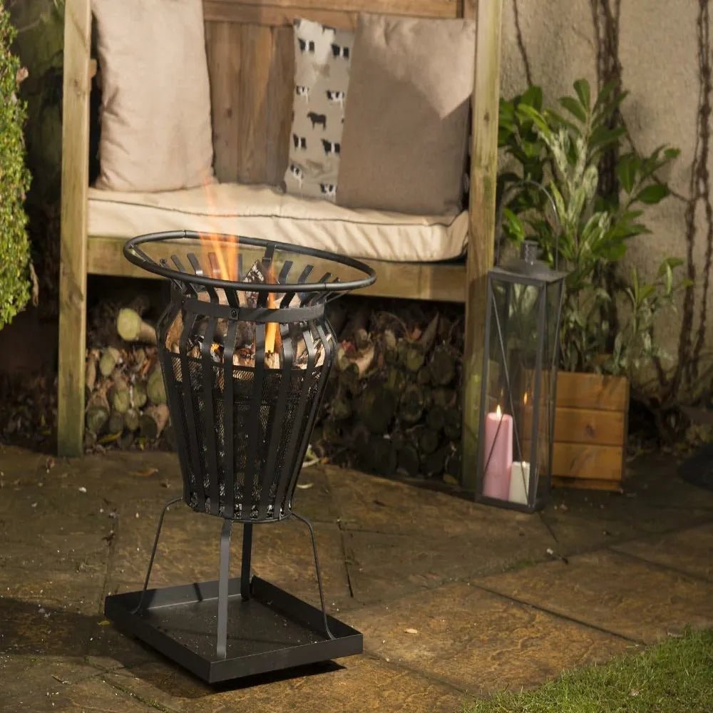 Black metal lifestyle signa firepit brazier with circular top vertical slats and square base for outdoor grilling